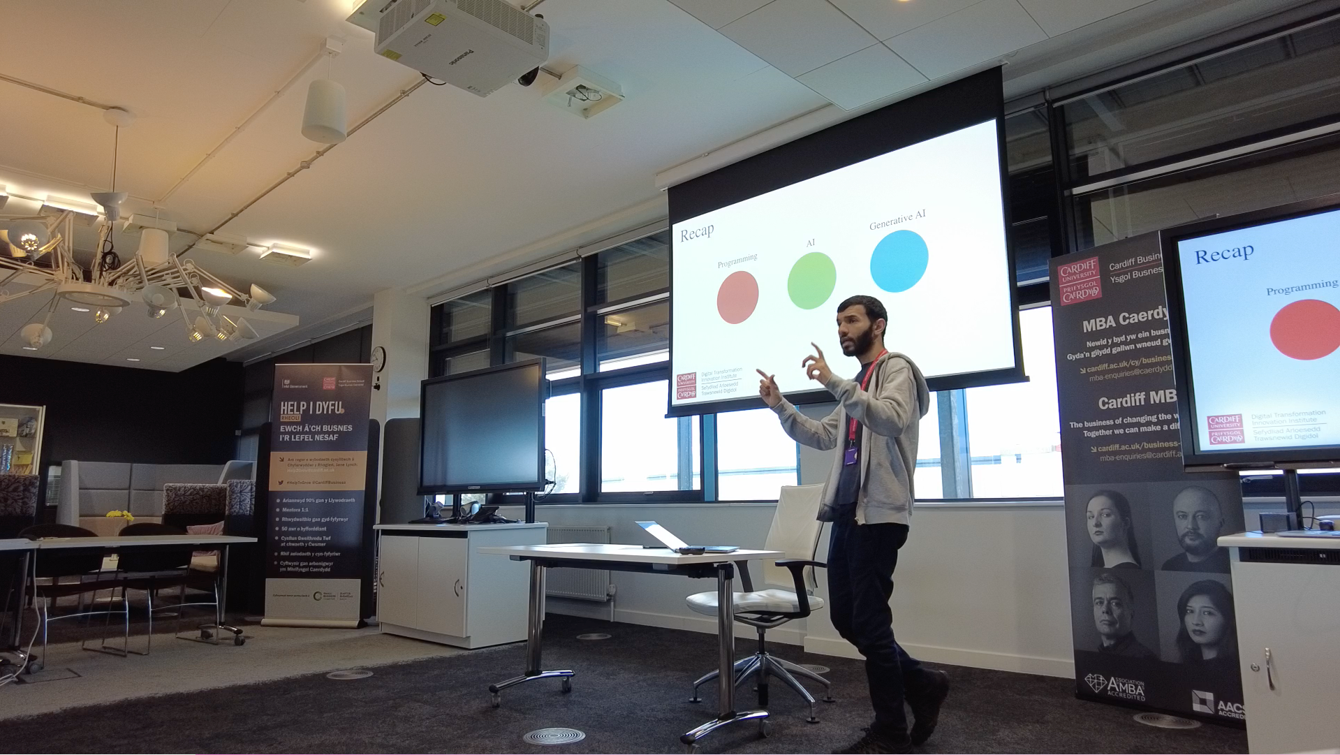 Ahmed Hamdy presenting Introduction to Chatbots and LLMs at a CPD workshop